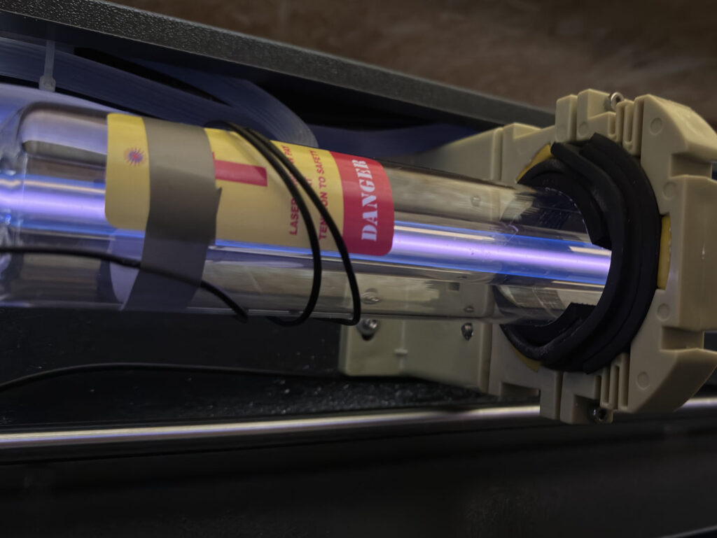 Strong, purple plasma beam in the CO2 laser tube

